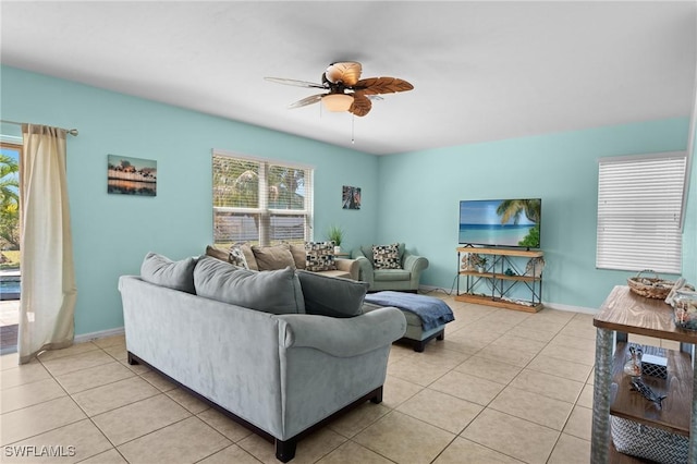 326 SW 31st St, Cape Coral, FL 33914 - living room featuring ceiling fan, a healthy amount of sunlight, and light tile patterned floors
