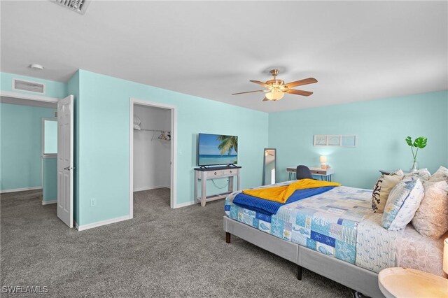 326 SW 31st St, Cape Coral, FL 33914 - carpeted bedroom with baseboards, visible vents, ceiling fan, and a spacious closet