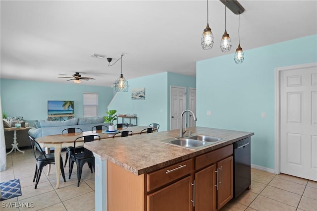 326 SW 31st St, Cape Coral, FL 33914 - kitchen featuring a ceiling fan, a sink, dishwashing machine, open floor plan, and hanging light fixtures