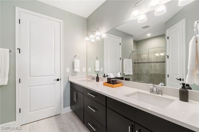 8021 Calle Canovas Ct, Naples, FL 34114 - full bathroom with a stall shower, double vanity, and baseboards