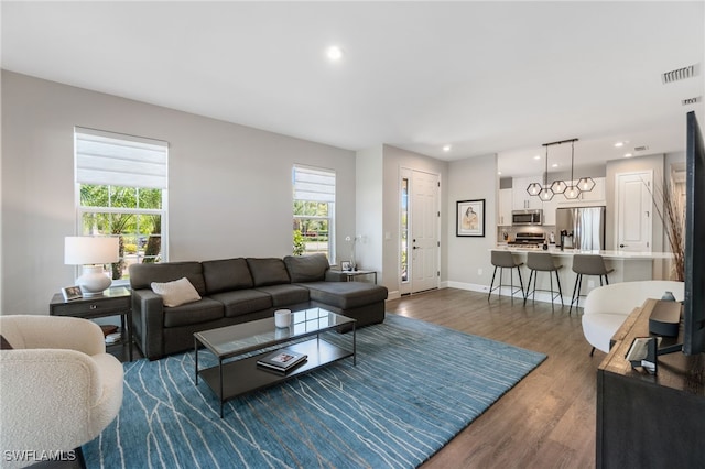8021 Calle Canovas Ct, Naples, FL 34114 - living area with dark wood-style floors, healthy amount of natural light, recessed lighting, and baseboards