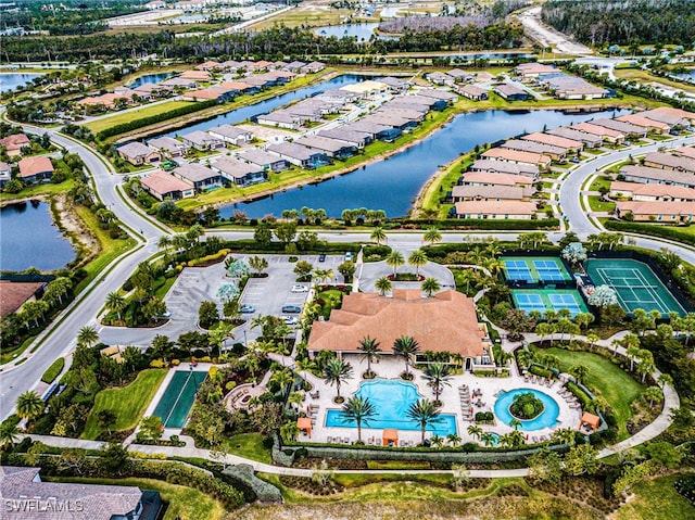 8021 Calle Canovas Ct, Naples, FL 34114 - aerial view of residential area featuring a large body of water and a pool area
