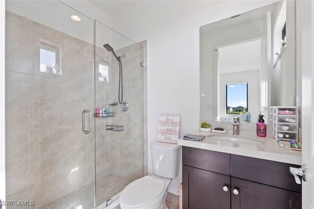 4802 Frattina St, Ave Maria, FL 34142 - bathroom featuring vanity, toilet, and a shower stall