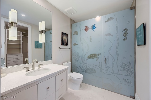 1230 Gulf Shore Blvd S, Naples, FL 34102 - bathroom featuring vanity, toilet, a walk in shower, and tile patterned floors