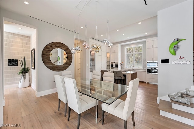 1230 Gulf Shore Blvd S, Naples, FL 34102 - dining room with light wood-style floors, recessed lighting, a chandelier, and baseboards