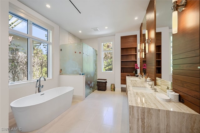 1230 Gulf Shore Blvd S, Naples, FL 34102 - full bath with a stall shower, a freestanding bath, vanity, recessed lighting, and baseboards