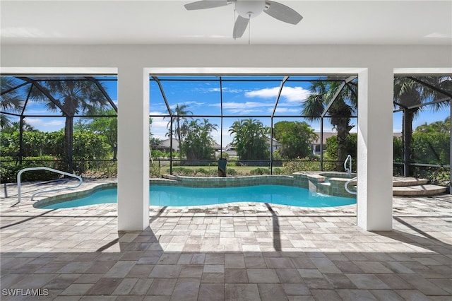 16404 Coco Hammock Way, Fort Myers, FL 33908 - view of pool with ceiling fan, glass enclosure, a patio, and a pool with connected hot tub