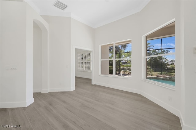 16404 Coco Hammock Way, Fort Myers, FL 33908 - unfurnished room with ornamental molding and light wood-type flooring