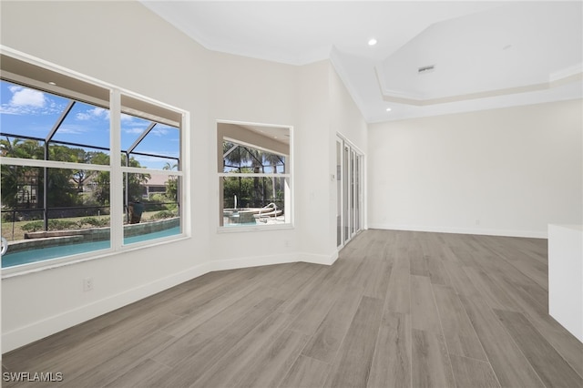 16404 Coco Hammock Way, Fort Myers, FL 33908 - unfurnished room featuring wood finished floors, ornamental molding, and recessed lighting