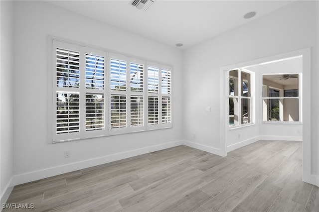 16404 Coco Hammock Way, Fort Myers, FL 33908 - spare room featuring a ceiling fan and wood finished floors
