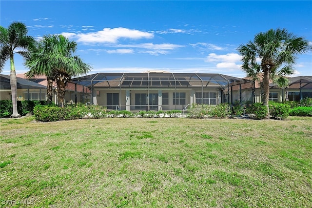 16404 Coco Hammock Way, Fort Myers, FL 33908 - rear view of house with a yard