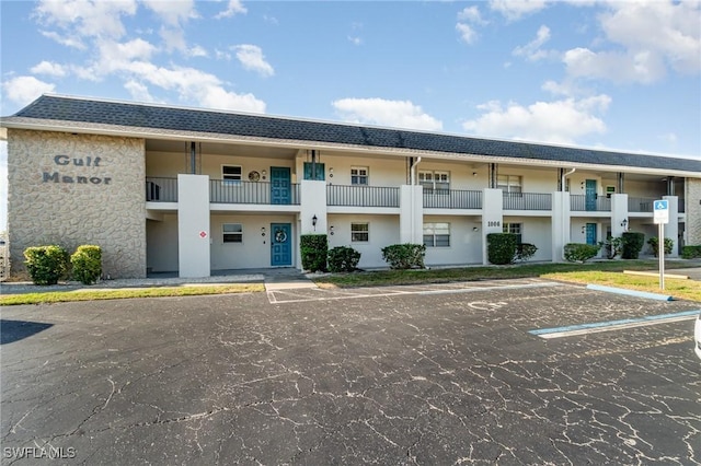 1006 SE 46th St Unit 1C, Cape Coral, FL 33904 - view of building exterior with uncovered parking