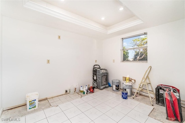 1006 SE 46th St Unit 1C, Cape Coral, FL 33904 - empty room with recessed lighting, a tray ceiling, ornamental molding, and a wood stove