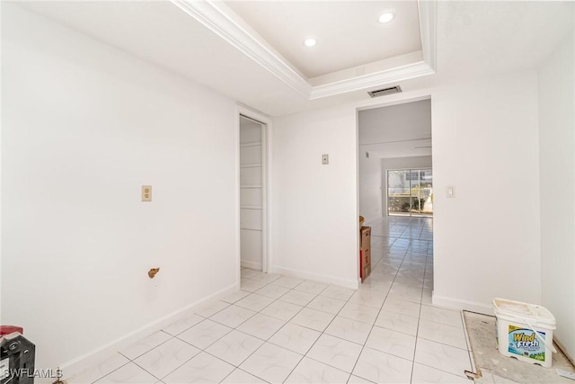 1006 SE 46th St Unit 1C, Cape Coral, FL 33904 - unfurnished room with visible vents, baseboards, crown molding, and a tray ceiling