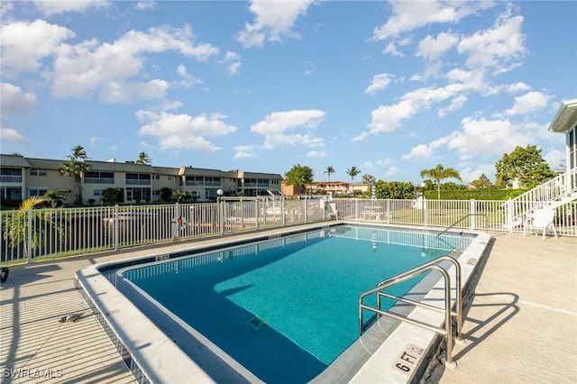 1006 SE 46th St Unit 1C, Cape Coral, FL 33904 - pool with a patio and fence
