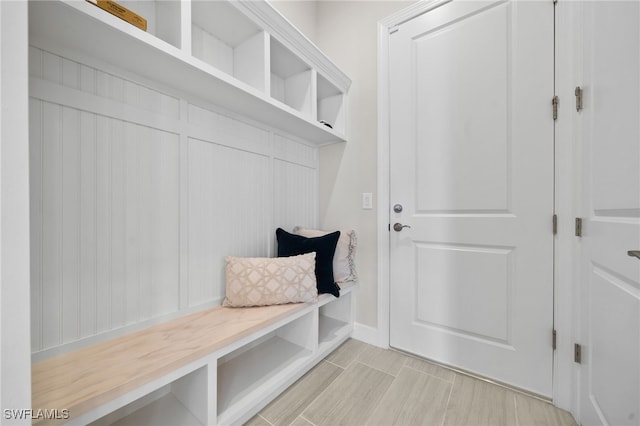 mudroom featuring wood finish floors