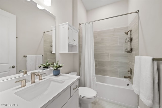full bathroom featuring vanity, toilet, and shower / bathtub combination with curtain
