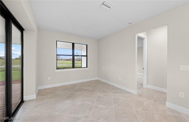 3056 Weston Manor Dr, Alva, FL 33920 - spare room featuring light tile patterned floors, baseboards, and visible vents