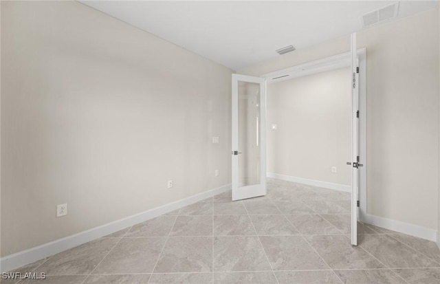 3056 Weston Manor Dr, Alva, FL 33920 - unfurnished bedroom featuring visible vents and baseboards
