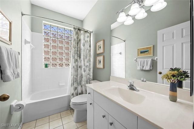 19765 Vintage Trace Cir, Estero, FL 33967 - bathroom featuring tile patterned flooring, toilet, vanity, shower / bath combo with shower curtain, and a chandelier
