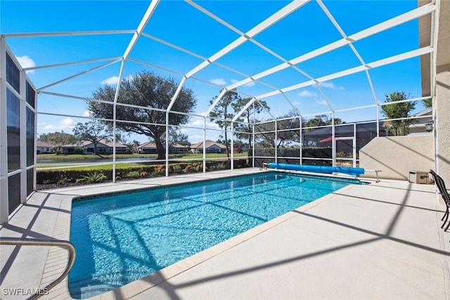19765 Vintage Trace Cir, Estero, FL 33967 - view of swimming pool with a patio area, a lanai, and a covered pool