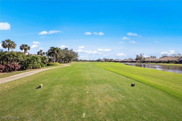 19765 Vintage Trace Cir, Estero, FL 33967 - view of property's community with golf course view, a lawn, and a water view