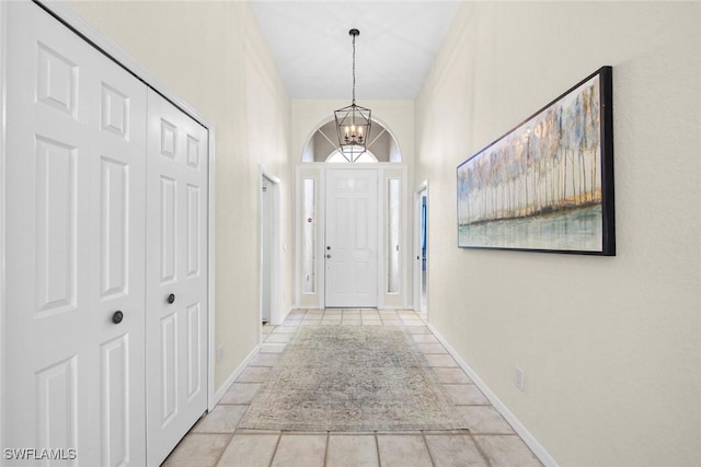 19765 Vintage Trace Cir, Estero, FL 33967 - interior space featuring baseboards and a notable chandelier