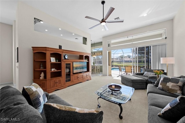19765 Vintage Trace Cir, Estero, FL 33967 - living area with carpet flooring, visible vents, recessed lighting, a ceiling fan, and a high ceiling