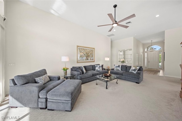 19765 Vintage Trace Cir, Estero, FL 33967 - living area featuring high vaulted ceiling, a ceiling fan, light carpet, baseboards, and visible vents