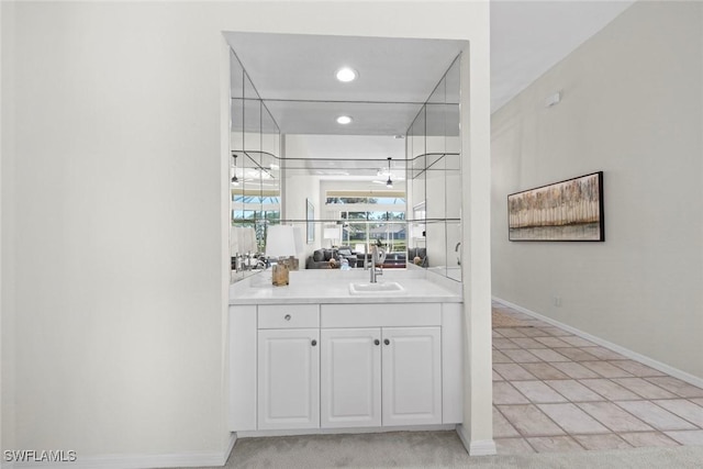 19765 Vintage Trace Cir, Estero, FL 33967 - bar with light tile patterned floors, baseboards, recessed lighting, and a sink