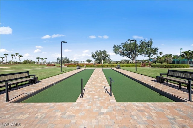 19765 Vintage Trace Cir, Estero, FL 33967 - view of home's community with a lawn