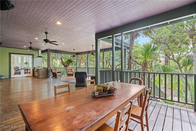20732 Charing Cross Cir, Estero, FL 33928 - sunroom / solarium with french doors, a ceiling fan, and outdoor dining area