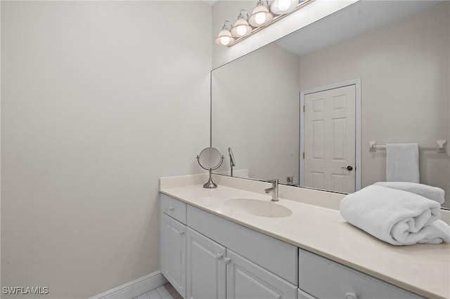 20732 Charing Cross Cir, Estero, FL 33928 - bathroom with vanity and baseboards