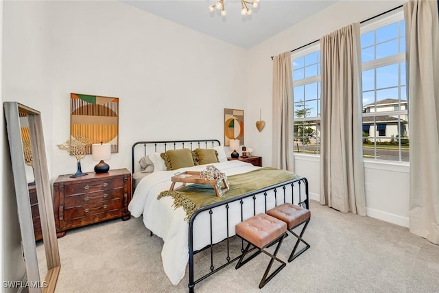 15445 Turin Dr, Naples, FL 34114 - bedroom featuring a chandelier, carpet, and baseboards