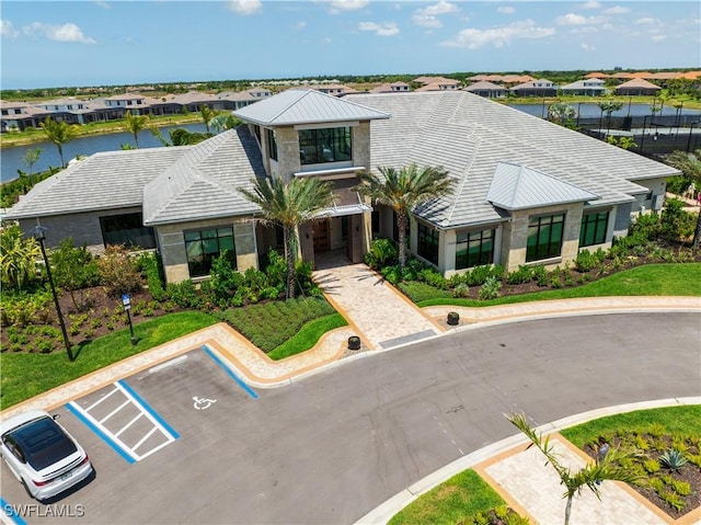 15445 Turin Dr, Naples, FL 34114 - view of front of property featuring a water view and a residential view