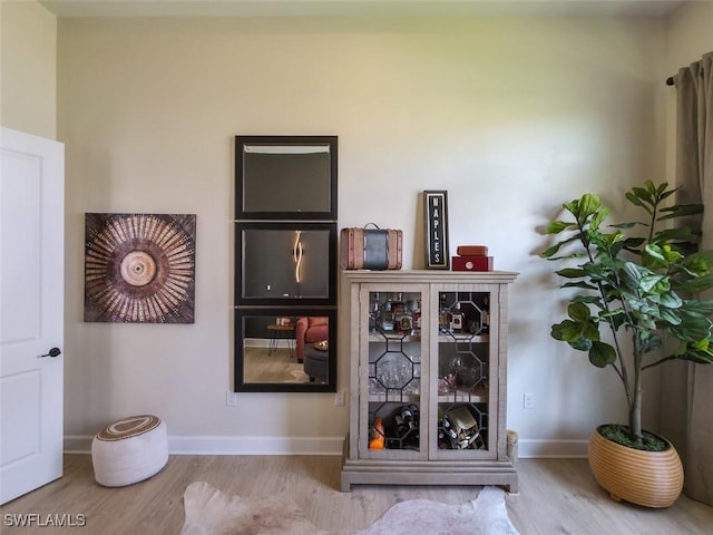 15445 Turin Dr, Naples, FL 34114 - detailed view of wood finished floors and baseboards