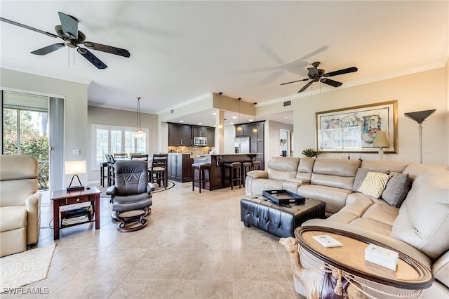 8201 Grand Palm Dr Unit 4, Estero, FL 33967 - living room with crown molding and ceiling fan