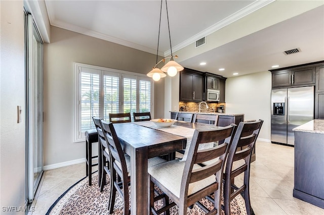 8201 Grand Palm Dr Unit 4, Estero, FL 33967 - dining area with baseboards, light tile patterned floors, crown molding, and recessed lighting