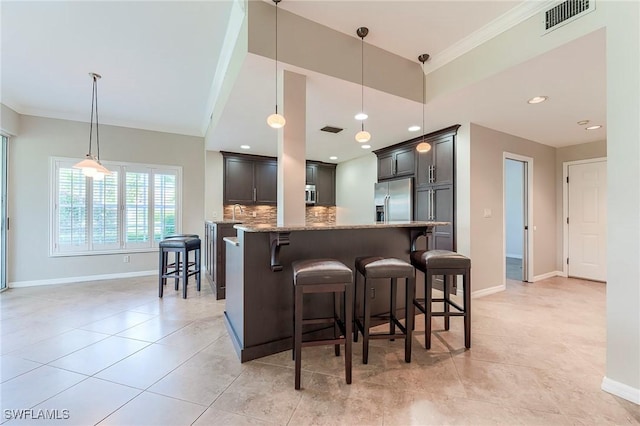 8201 Grand Palm Dr Unit 4, Estero, FL 33967 - kitchen featuring stainless steel fridge with ice dispenser, tasteful backsplash, light stone countertops, baseboards, and ornamental molding