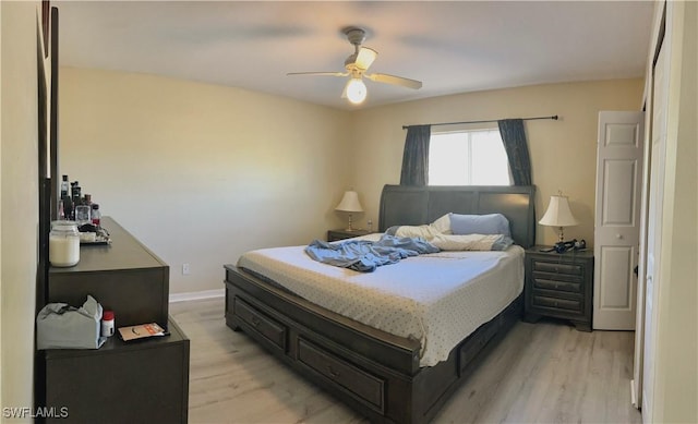 4844 Golfview Blvd, Lehigh Acres, FL 33973 - bedroom with a ceiling fan, baseboards, and light wood finished floors