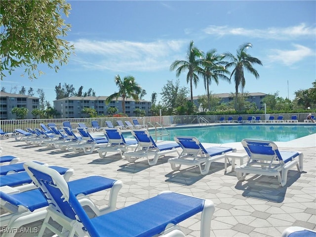 16605 Lake Circle Dr Unit 337, Fort Myers, FL 33908 - pool featuring a patio area and fence