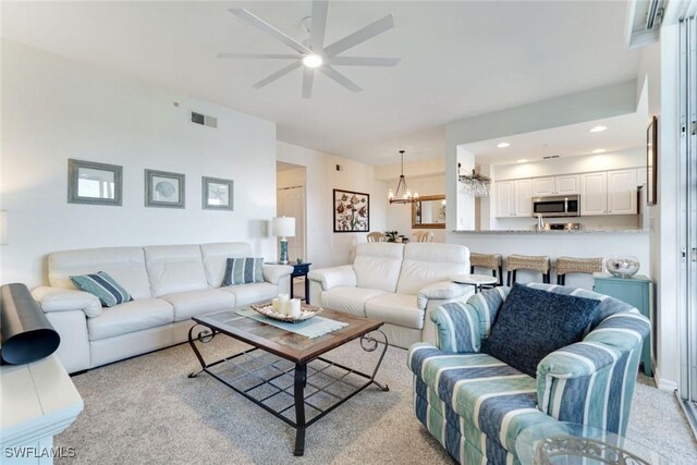 16605 Lake Circle Dr Unit 337, Fort Myers, FL 33908 - living area with recessed lighting, visible vents, ceiling fan with notable chandelier, and light colored carpet