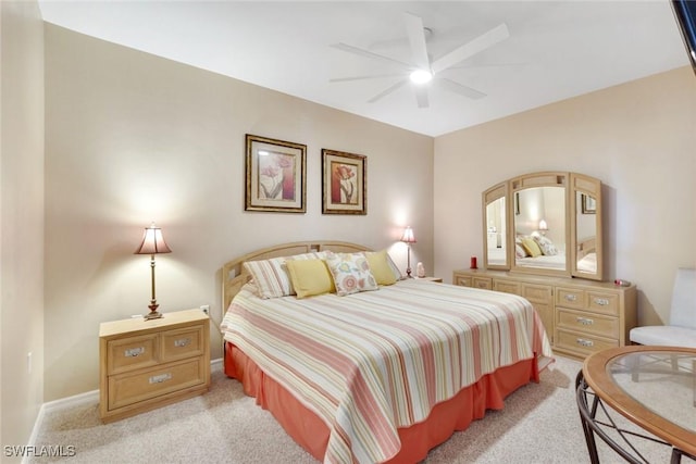 16605 Lake Circle Dr Unit 337, Fort Myers, FL 33908 - bedroom with light colored carpet, baseboards, and ceiling fan