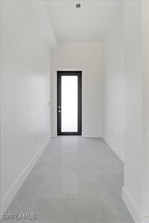 9020 S Casa Ct, Labelle, FL 33935 - unfurnished room featuring baseboards
