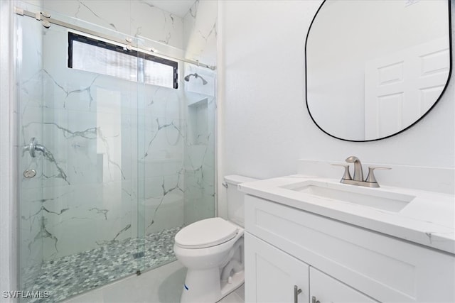 9020 S Casa Ct, Labelle, FL 33935 - bathroom featuring a marble finish shower, toilet, and vanity