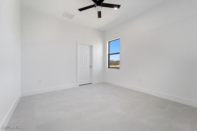 9020 S Casa Ct, Labelle, FL 33935 - empty room featuring visible vents, baseboards, and a ceiling fan