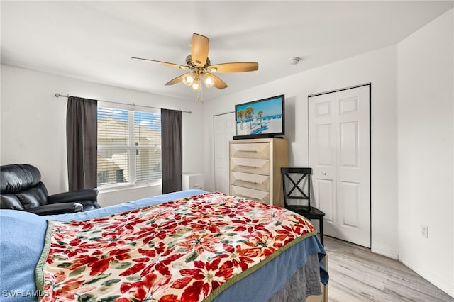 3627 Pine Oak Cir Unit 101, Fort Myers, FL 33916 - bedroom with light wood-style flooring and ceiling fan