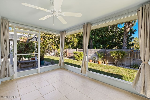 13 Knights Bridge Rd Unit A49, Naples, FL 34112 - unfurnished sunroom with a ceiling fan