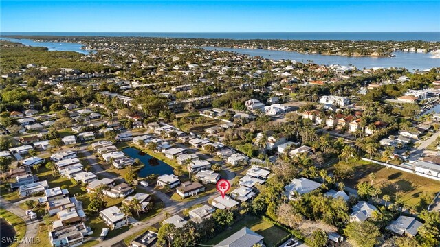 13 Knights Bridge Rd Unit A49, Naples, FL 34112 - aerial view of property's location with a large body of water and nearby suburban area