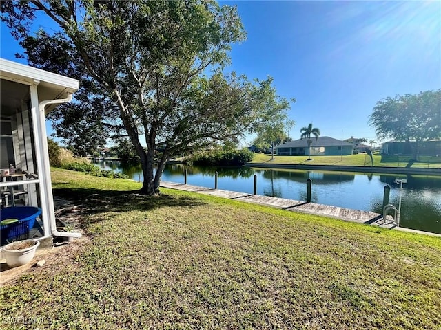 view of yard with a water view